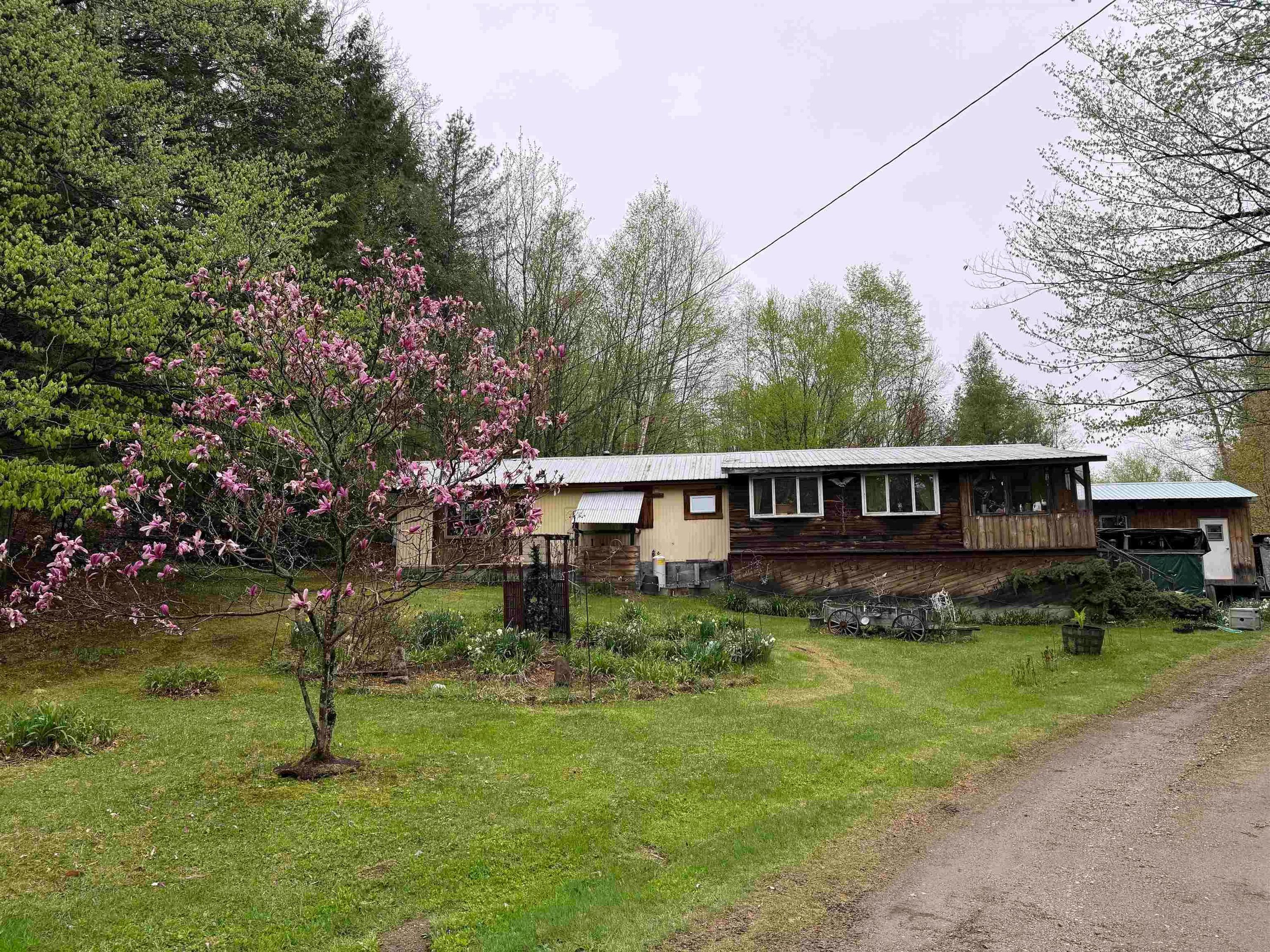Price reduced on this 10 acre parcel in Chester, VT!  There is a 1972 mobile home with 2 bedrooms an