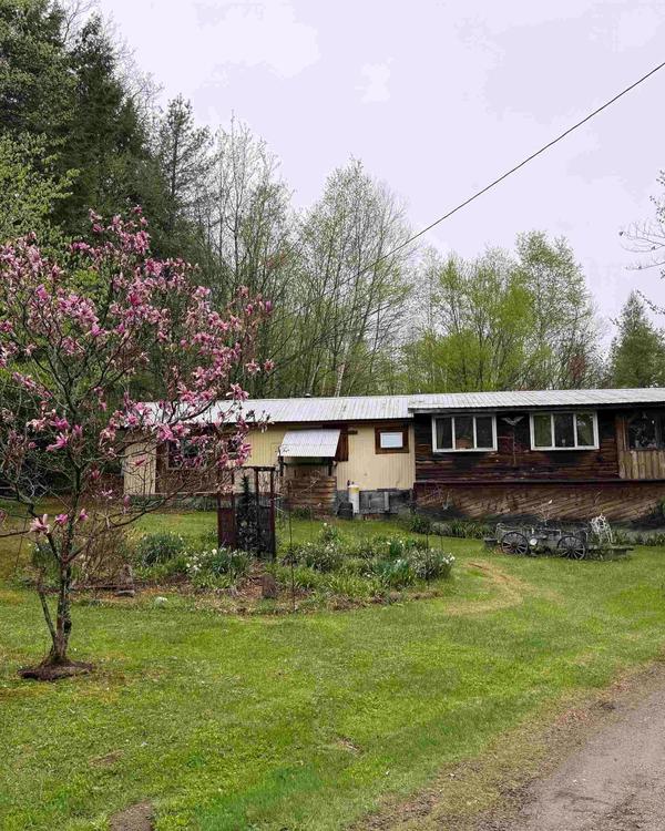 Price reduced on this 10 acre parcel in Chester, VT! There is a 1972 mobile home with 2 bedrooms an