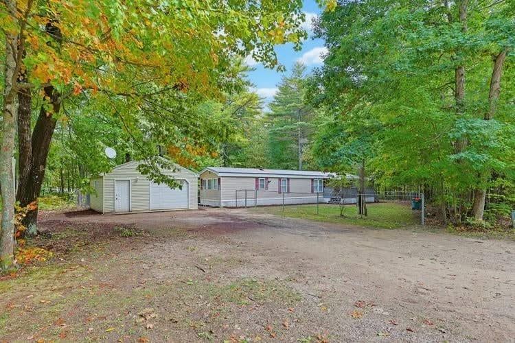 Completely refreshed 4-bedroom, 1.5-bath home set on a private 1.1-acre lot. The home features a bra