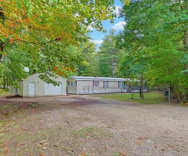 Completely refreshed 4-bedroom, 1.5-bath home set on a private 1.1-acre lot. The home features a bra