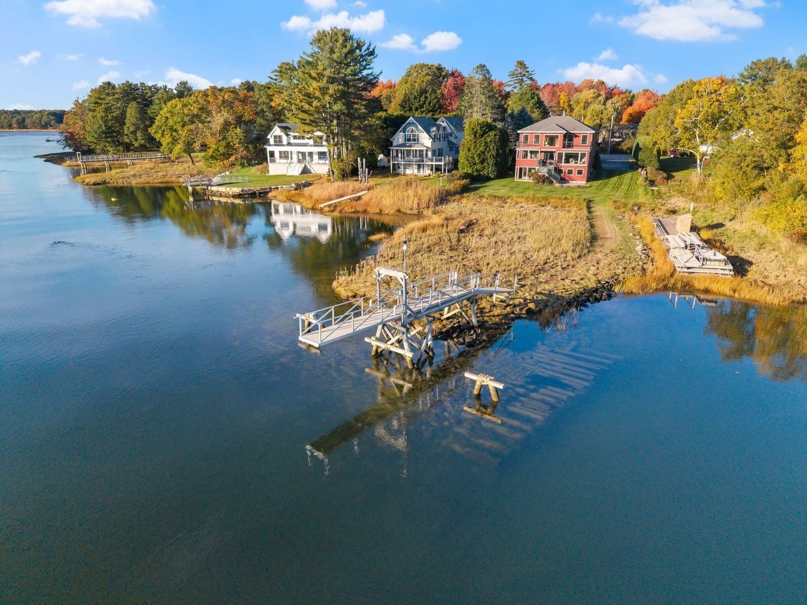 Your waterfront sanctuary awaits. This meticulously maintained home sits on .89 acres on a quiet dea