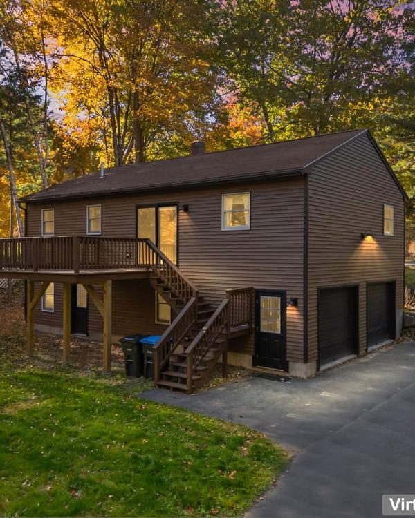 This single-level living with a practical layout offers more than meets the eye. Nestled on a tree-l